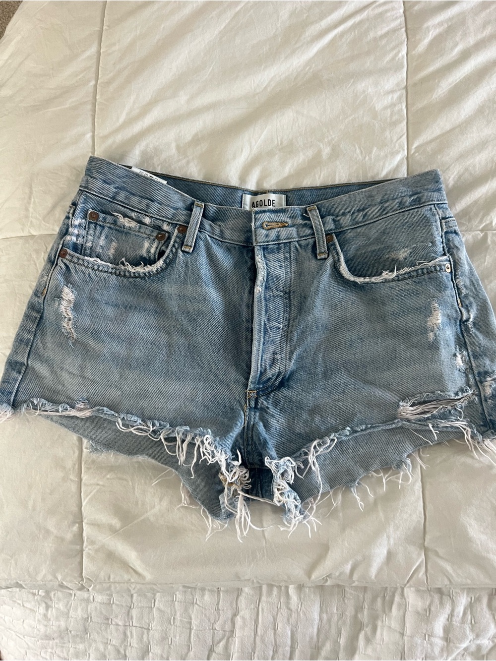 Agolde Light Wash Distressed Denim Cutoff Shorts